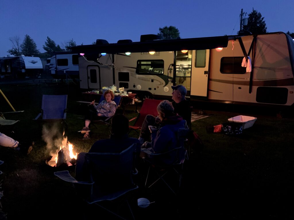 Enjoying a campfire on our site at Craigleith RV Resort